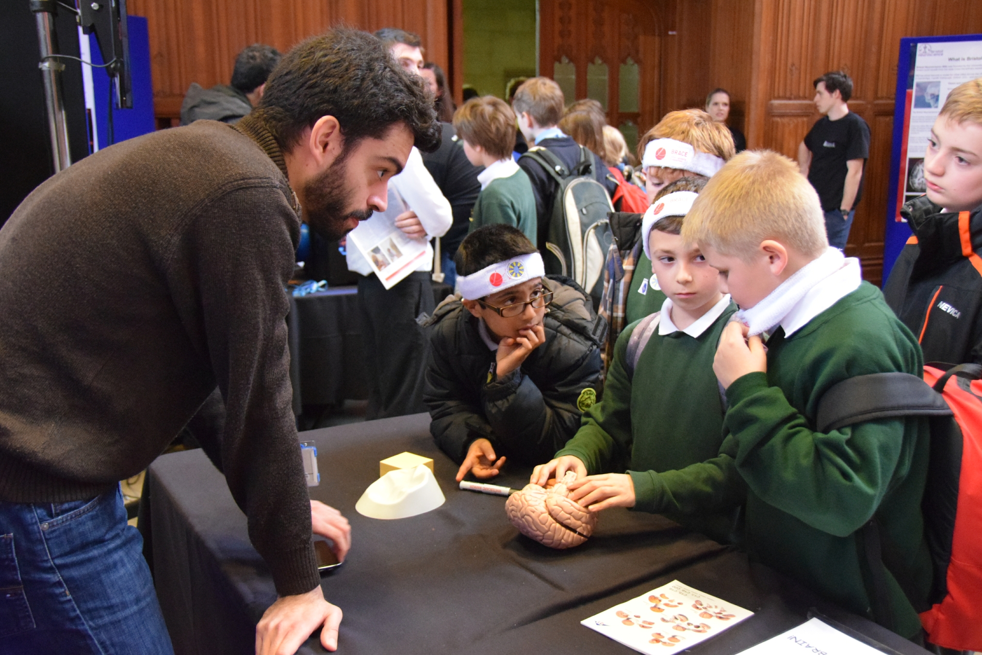 School children at the looking at brains activity stall